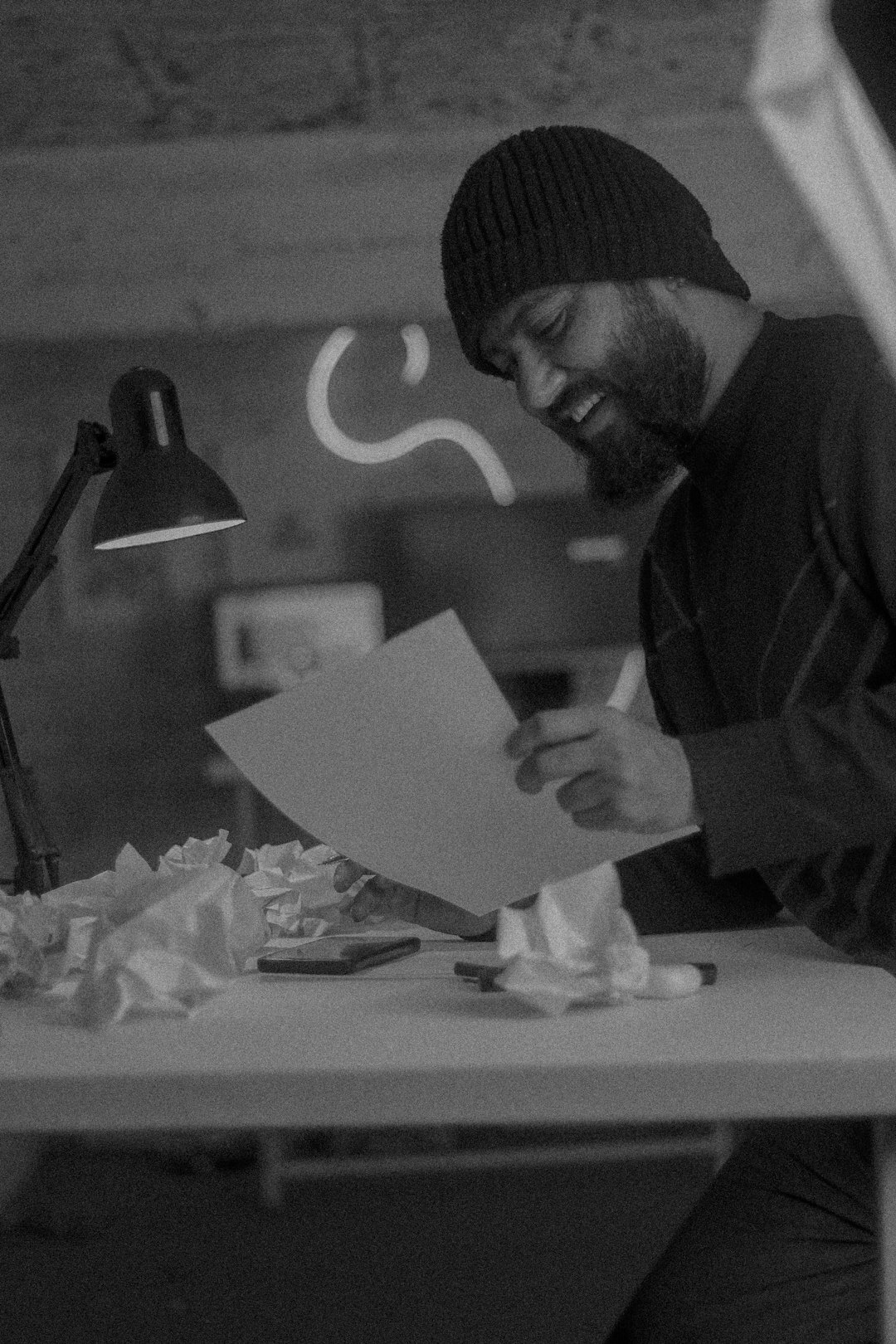 mystery writer at desk with notes