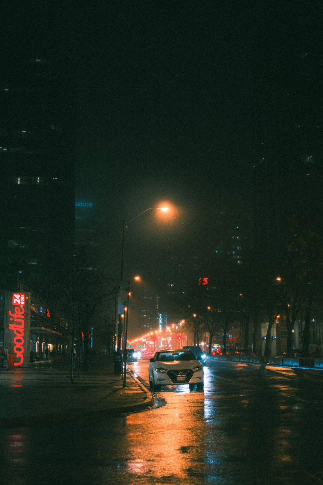 rainy city street at night